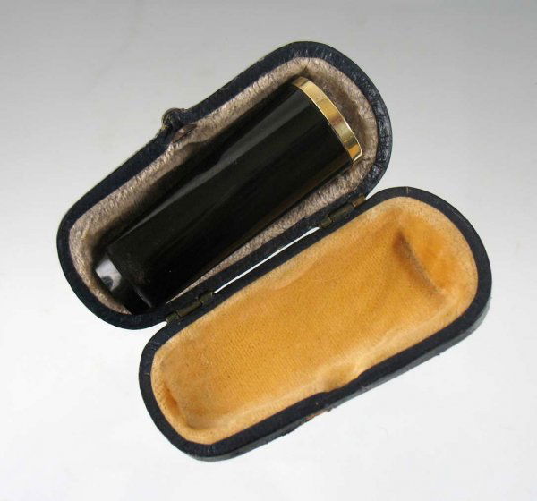 14k gold rimmed cigar holder with fitted case, 2 1: 14k gold rimmed cigar holder with fitted case, 2 1/4" long, rim is marked 14k, no visible defects; velvet lined case marked London Made, outside of case is worn