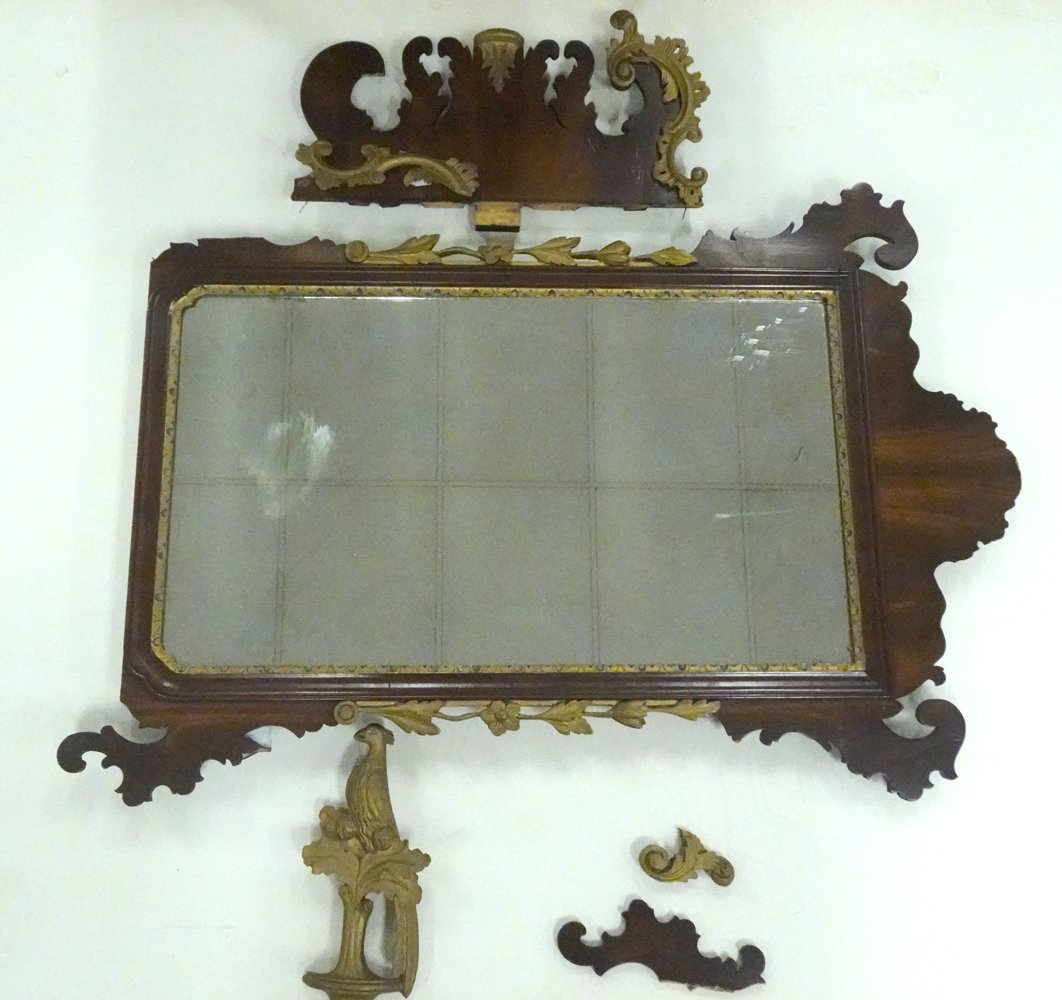 Mahogany Chippendale mirror: Mahogany Chippendale mirror, bird finials, parcel gilt decoration and liner, late 18th C., 55 1/2" x 26 1/2"