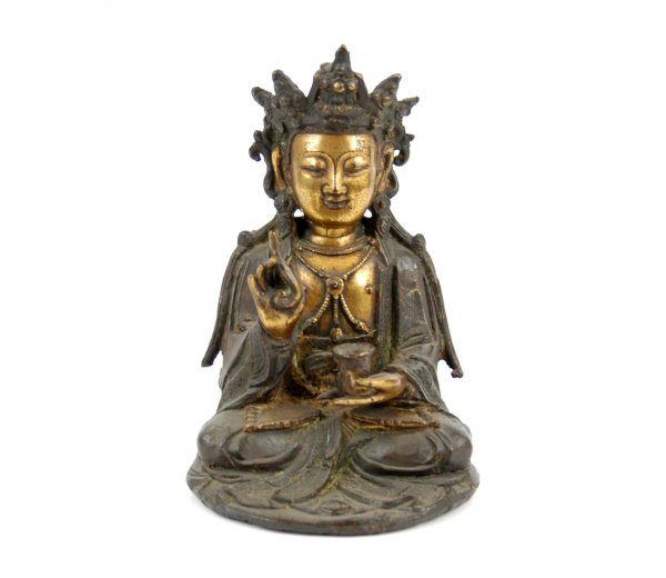 Statue of a Buddhist Bodhisattva, in bronze and gil: Statue of a Buddhist Bodhisattva, in bronze and gilt, seated in meditation posture, holding begging bowl in left hand and medicinal root in right hand. Probably Bodhisattva of Medicine, wearing typica
