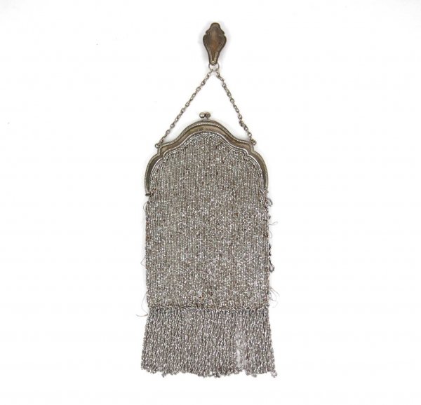 Velvet and steel bead purse with chatelaine clip, : Velvet and steel bead purse with chatelaine clip, C. 1900, silver plated frame and clip, 8 1/2" long plus 3" fringe, one side fully beaded with faceted steel beads, reverse is black velvet, marked C. 