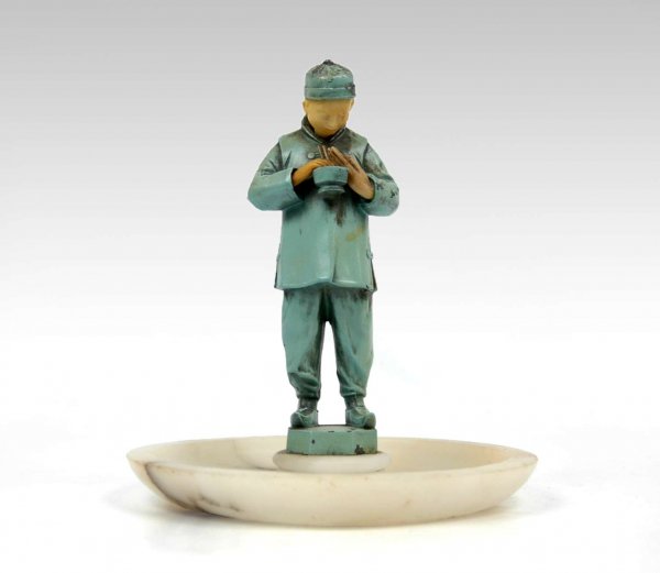 In the style of J.B. Hirsch painted bronze and ivo: In the style of J.B. Hirsch painted bronze and ivorine figurine on round white marble cache, standing Chinese man with rice bowl, 9 1/2" high x 8" diameter, early 20th C.