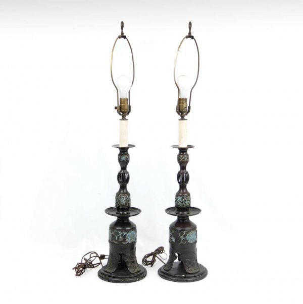 Pair of bronze champleve lamps, pierced and banded: Pair of bronze champleve lamps, pierced and banded decoration, on round wooden base, 19 1/2" to top of bronze