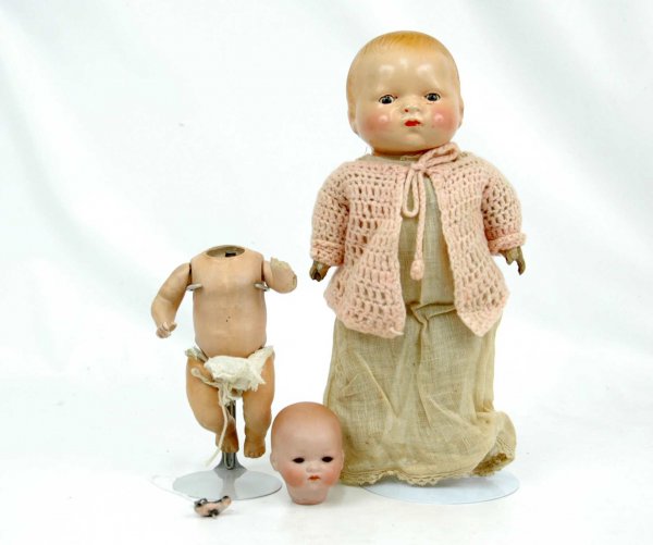 Two dolls, including bisque head doll, 8", marked : Two dolls, including bisque head doll, 8", marked "A.M. Germany, 341/4/0K", sleep eyes (not mounted in head), closed mouth, compo and papier mache body, head not attached to body, loss to left arm bel