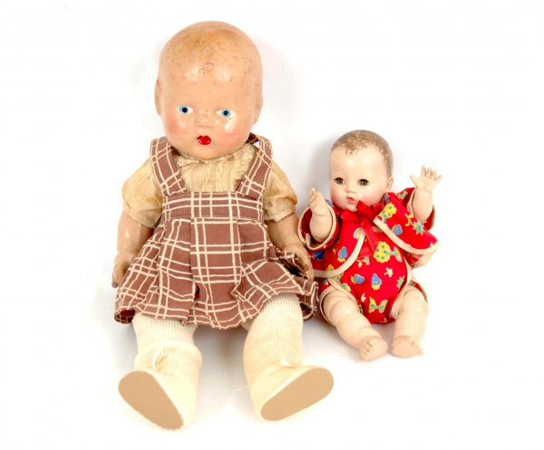 Two compo babies including 17" girl in plaid dress: Two compo babies including 17" girl in plaid dress and white blouse, blue painted eyes, molded light brown hair, loss to compo on body, damage and repairs to tips of fingers, slight loss to head, unma