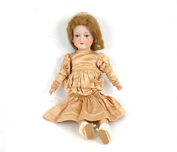 Bisque head doll, 23", blue sleep eyes, open mouth: Bisque head doll, 23", blue sleep eyes, open mouth with teeth, light brown wig, compo body, marked on back of head "Armand Marseille, 390 n, Germany, A. 7 M." dressed in new gold colored Renaissance s