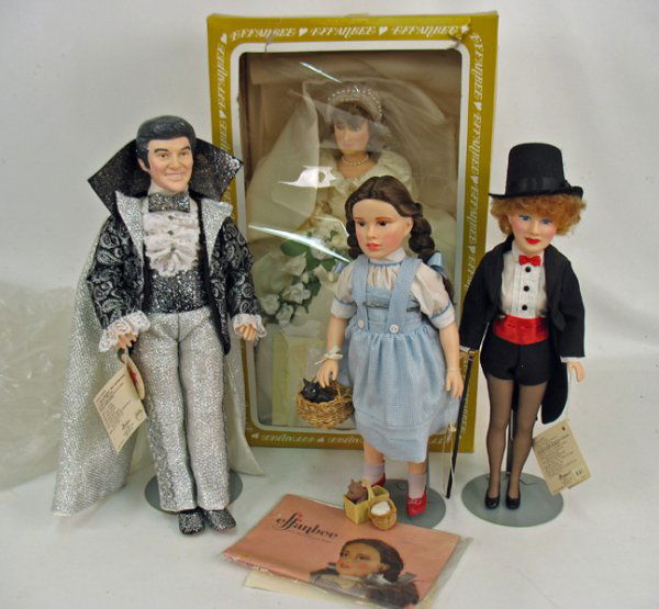 Four Effanbee character dolls, including Princess: Four Effanbee character dolls, including Princess Diana with box and certificate (box has some damage), Lucille Ball, Liberace and Dorothy, with wrist tags