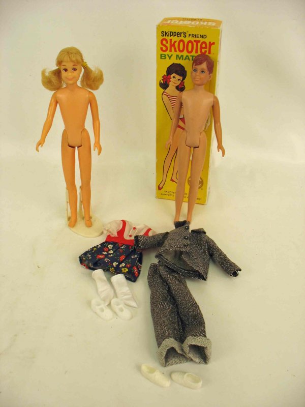 Skooter doll in original box, and Ricky doll: Skooter in original box, blonde pigtails, tear to left foot, with untagged dress, white socks and shoes, Ricky doll marked "1963 MATTEL", slight wear to hair, pants and jacket tagged "Hong Kong", whit