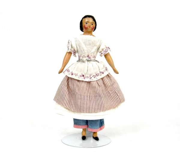 Papier mache and wood milliner's model doll, 7 1/4: Papier mache and wood milliner's model doll, 7 1/4", represents child, black hair, painted features, hand stitched clothing