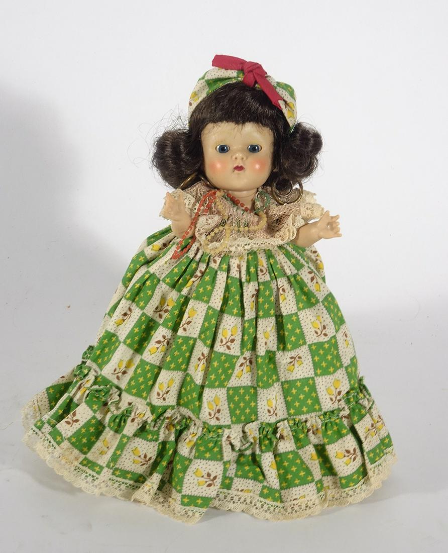 Vogue 1952 hard plastic Ginny Frolicking Fables Calypso: Vogue 1952 hard plastic Ginny Frolicking Fables Calypso or Gypsy, original doll with hoop earrings and outfit, missing fruit basket on head