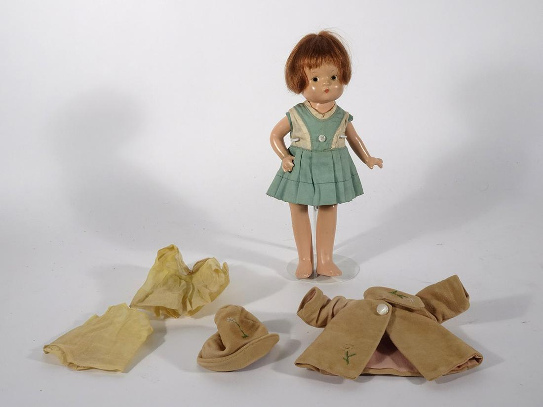 1930: 1930's Effanbee Patsyette composition doll , 9", marked Patsyette, jointed head, arms and legs, painted side glancing eyes, bob style hair, closed mouth with original wardrobe, one tagged