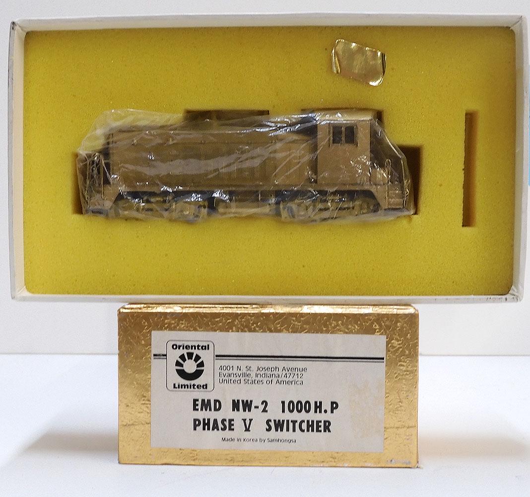 1980's Oriental Limited by Samhongsa (Korea) unpainted: 1980's Oriental Limited by Samhongsa (Korea) unpainted brass HO gauge EMD NW-2 1000 HP Phase 5 Diesel switcher. Still wrapped in factory plastic. Box measures approximately 9" X 5" X 3'.