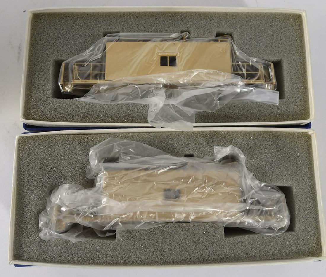Two brass HO gauge Penn Central Transfer cabooses in (1 of 1)