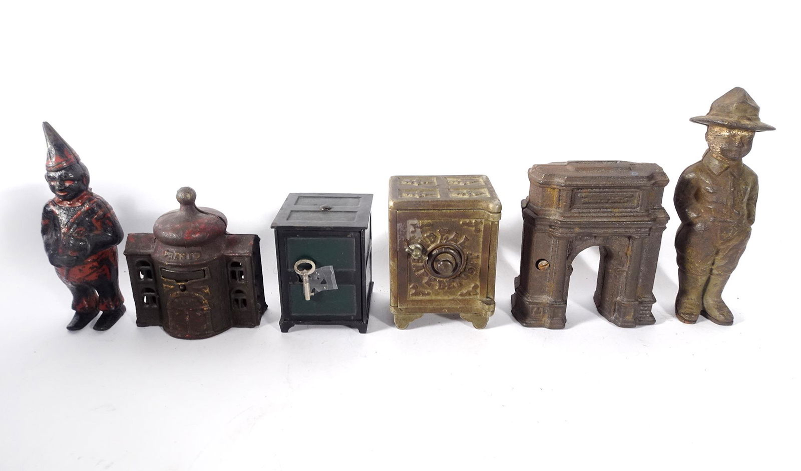 Six vintage cast iron banks (1 of 1)