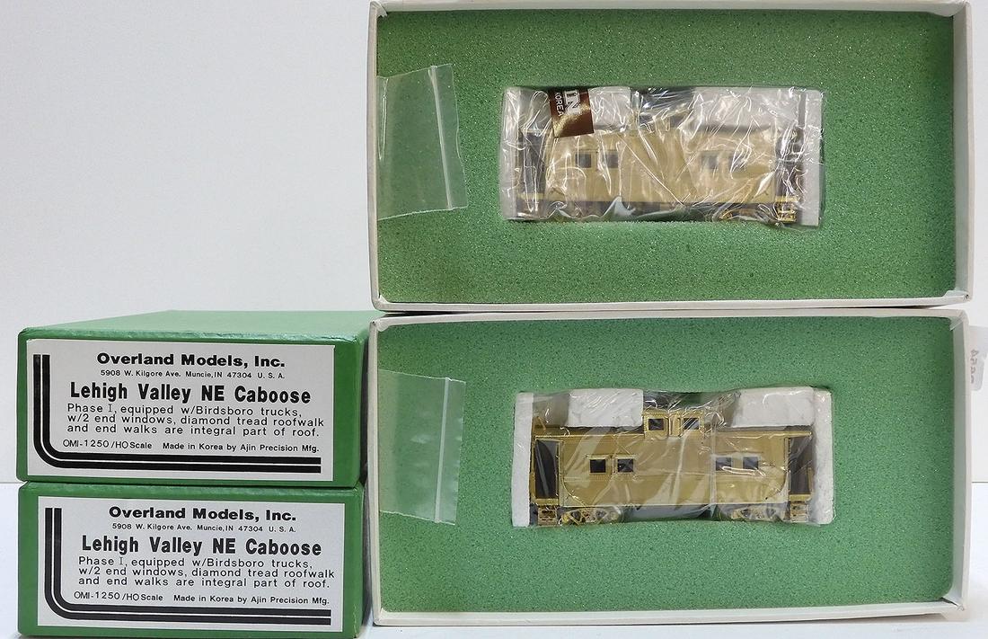 Two brass HO gauge Lehigh Valley NE cabooses in (1 of 4)
