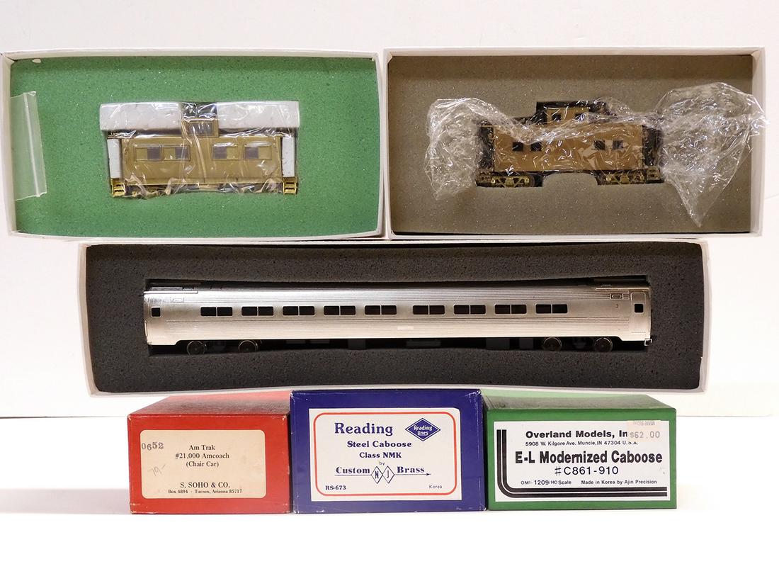 Two 1980's unpainted brass cabooses and a 1970's cast (1 of 4)