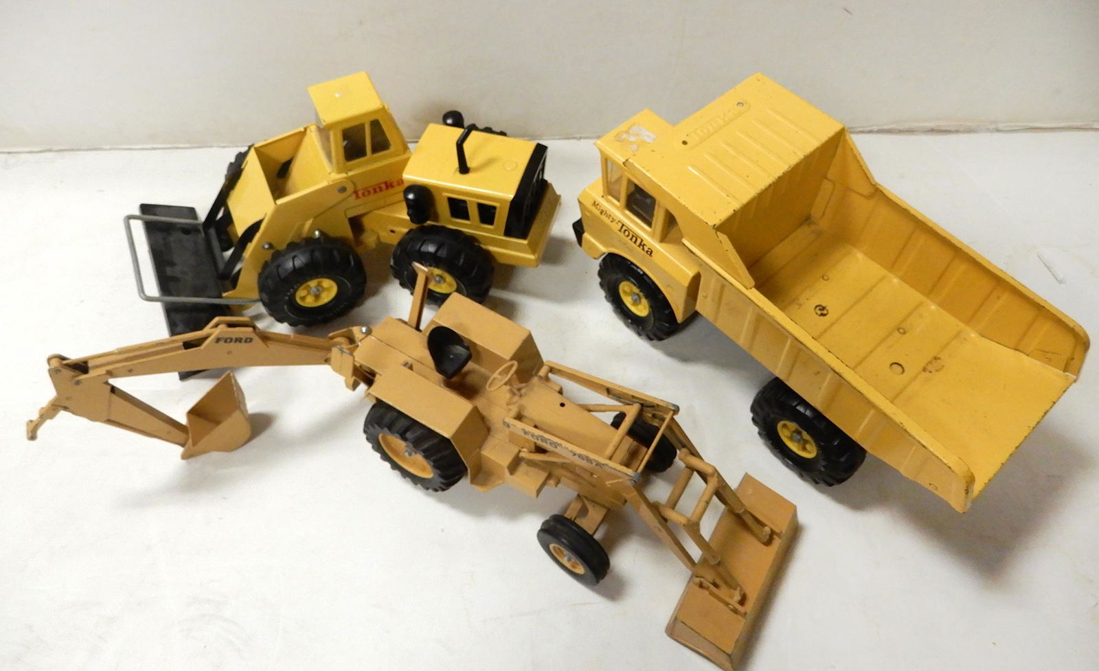 Three 1970's-1980's large pressed steel and die-cast (1 of 1)