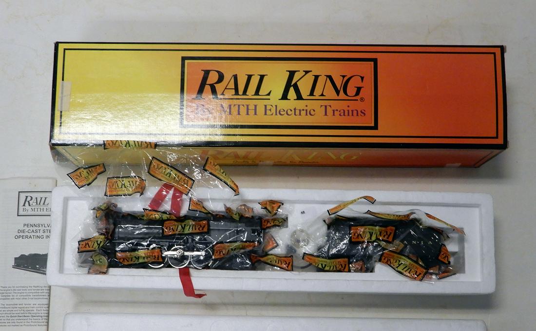 1990's MTH 4-6-2 O gauge steam engine: 1990's MTH 30-1115-1 gauge steam engine in original box. This Korean made K-4 black painted die cast steam engine with matching die cast tender marked for the PRR. Engine is equipped with smoke, whist