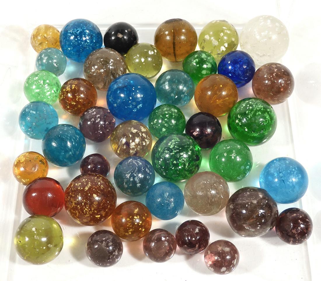 42 vintage MICA marbles: 42 vintage MICA marbles. See pictures for visual description.