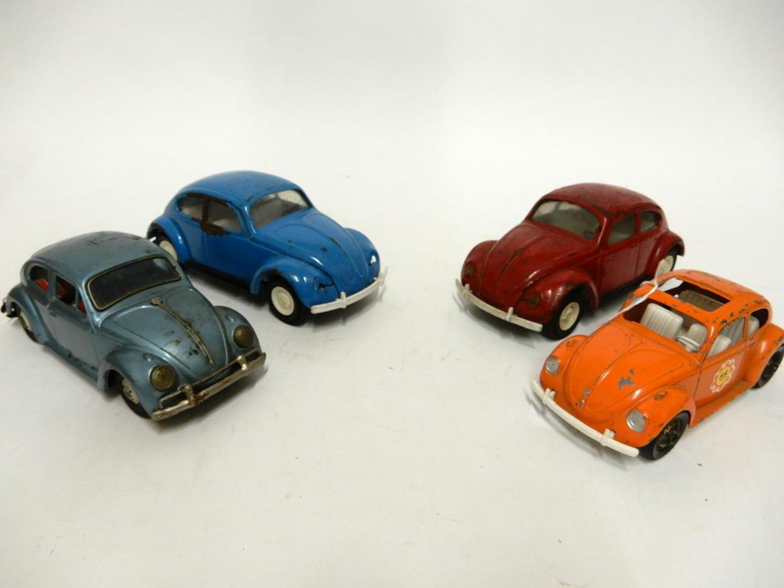 Four scale model Volkswagon beetles (1 of 4)