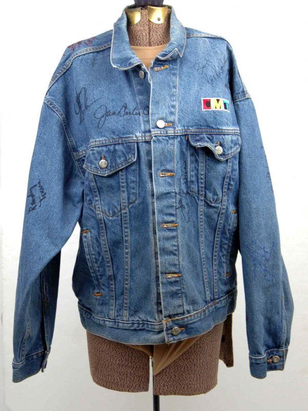 Country Music Television signed denim jacket, vari: Country Music Television signed denim jacket, various signatures from country music singers including June Carter Cash, Johnny Cash, Hank Williams, Tim Magraw, Naomi and Winona Judd, Randy Travis, Lea
