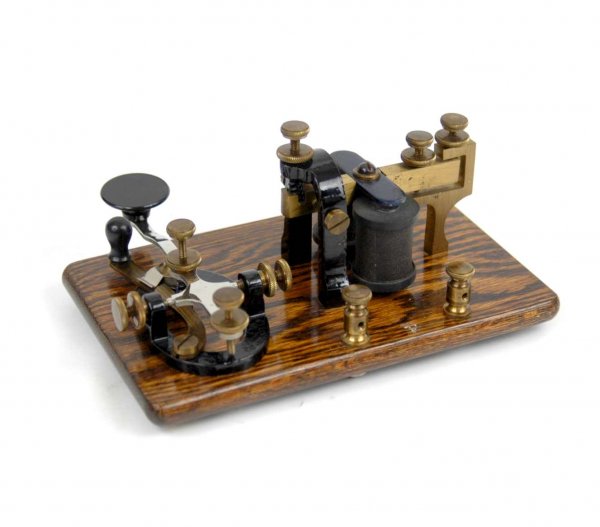 Telegraph sender & receiver on wooden base, number: Telegraph sender & receiver on wooden base, number "4" impressed on top of base, 3 1/2" high x 7" across x 4 1/2" deep, late 19th to early 20th C.