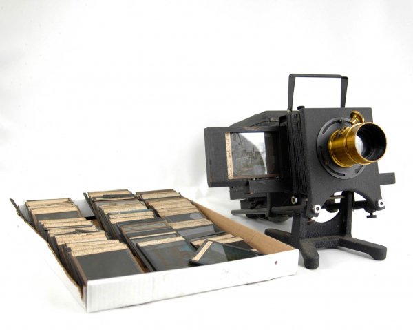Grouping of 84 colored and black and white Magic L: Grouping of 84 colored and black and white Magic Lantern glass slides and Keystone View Co. Magic Lantern, manufactured by Bausch & Lomb Optical Co. Rochester, N.Y. U.SA No. AE699, primarily of Switze