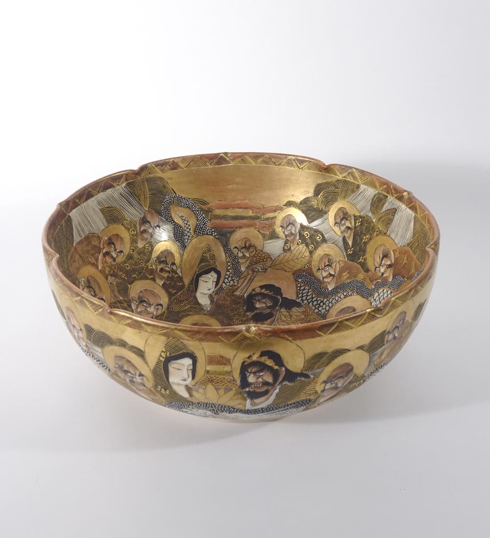 Japanese Satsuma Earthenware Bowl: Japanese Satsuma earthenware bowl with 1000 Face and moriage dragon motifs, circa 1868-1912 Meiji period, signed on base, 5 1/4" x 12 1/4"