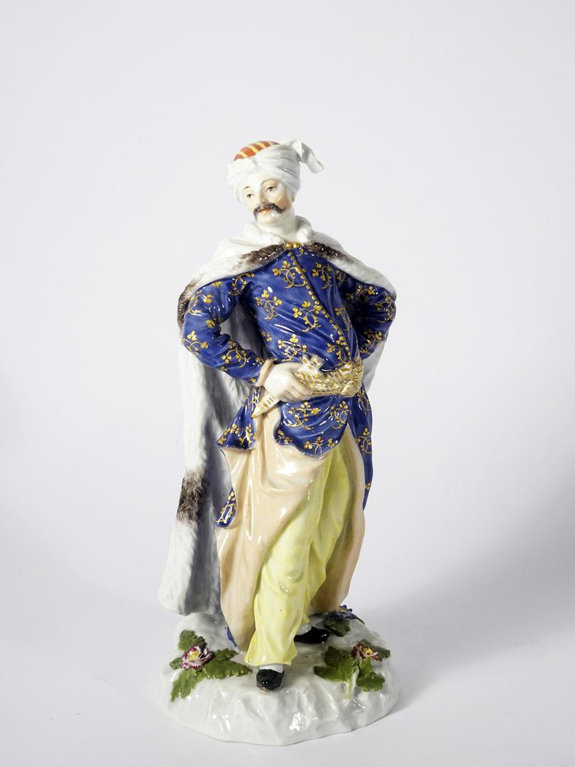 Meissen Porcelain Turkish Soldier Figurine: Meissen porcelain Turkish soldier figurine, 19th c. marked on base with underglaze blue crossed swords and incised 1286 and 147 numbers, 19th c., 9" high
