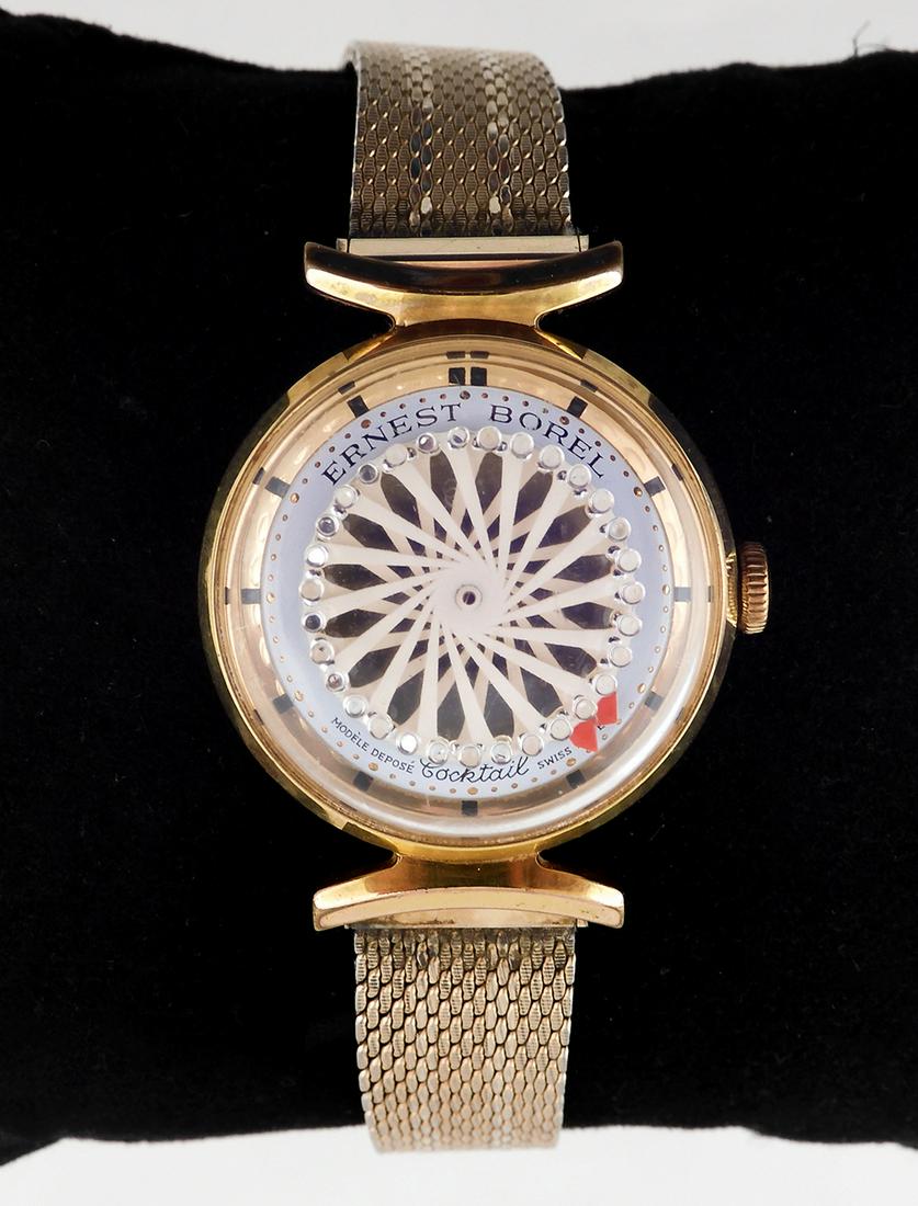 Ernest Borel Kaleidoscope Wristwatch: Ernest Borel Kaleidoscope Wristwatch 17 jewel skeleton back and goldtone mesh bracelet