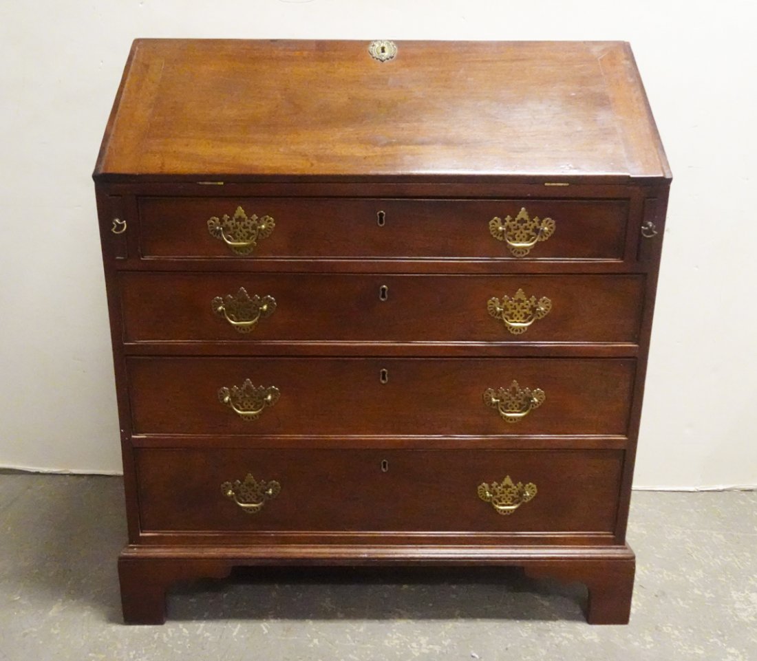 Chippendale Slant Front Desk: Chippendale slant front desk, interior with blocked center drawers flanked by valanced cubbies, molded base with ogee bracket feet, late 18th c., 41 1/2" x 35 1/2" x 19 1/2"