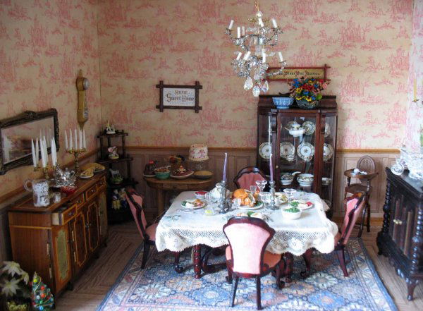 Diorama of dining room with Christmas dinner, some: Diorama of dining room with Christmas dinner, some furnishings and dolls custom made and artist signed
