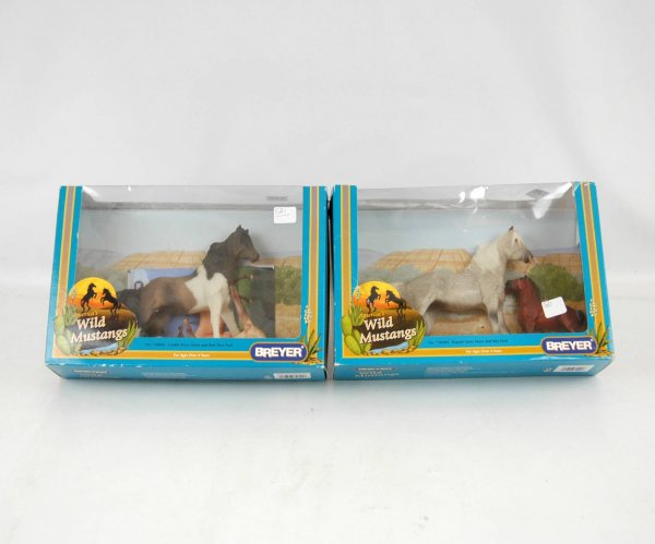 Two Breyer Horse America's Wild Mustangs sets with: Two Breyer Horse America's Wild Mustangs sets with boxes including No. 750601 Grullo Pinto Mare and Red Dun Foal and No. 750502 Dapple Grey Mare and Bay Foal