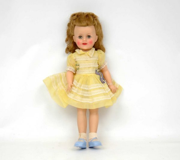 Vinyl Ideal Shirley Temple, 17", with original tag: Vinyl Ideal Shirley Temple, 17", with original tagged dress C. 1950's