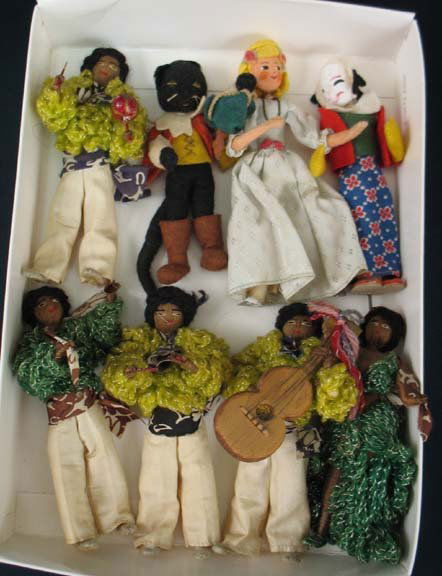 Eight small dolls C. 1930's and 1940's: Eight small dolls C. 1930's and 1940's including puppet, Puss in Boots, five piece band and girl doll, includes German Baps