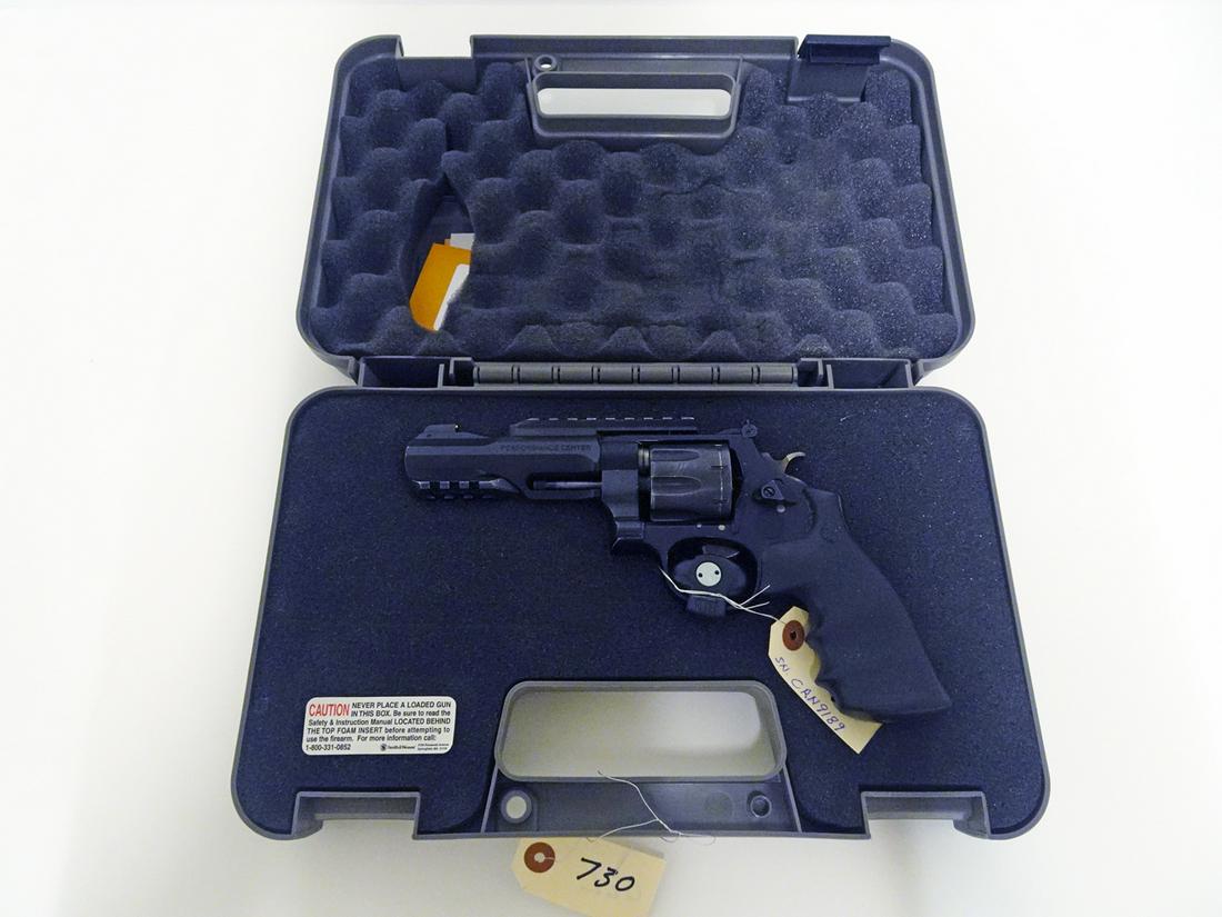 Smith & Wesson Model 327-TRR8 Revolver: Smith & Wesson Performance Center model 327-TRR8 revolver, double action, .357 caliber, 8 shot, serial number CRN9189, barrel length 5", overall length 10", comes with hard side carry case and scope m