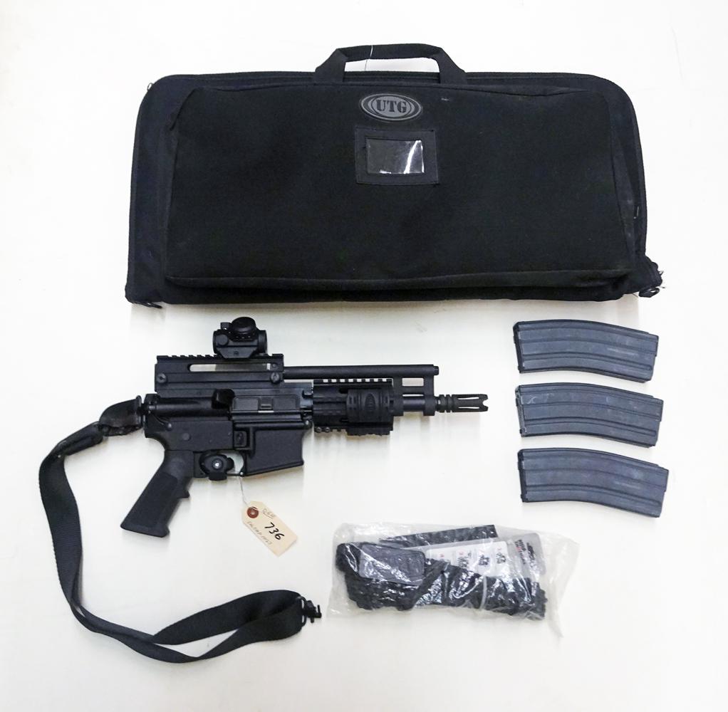Olympic Arms UTG Model O.A.P. Rifle: Olympic Arms UTG model O.A.P. rifle, semi-automatic, .223 caliber, 30 shot, 3 magazine, serial number OAP 1027, barrel length 8 1/2" with flash suppressor, overall length 17 1/2", comes with soft side