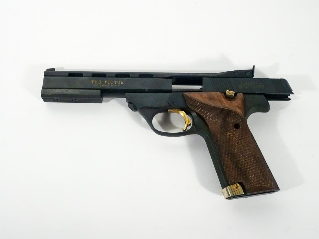 High Standard The Victor Model Pistol: High Standard The Victor model pistol, semi-automatic, .22 L.R. caliber, 10 shot, magazine feed, serial number ML25312, barrel length 5 2/8", overall length 9 1/2", C & R NO, Instacheck YES