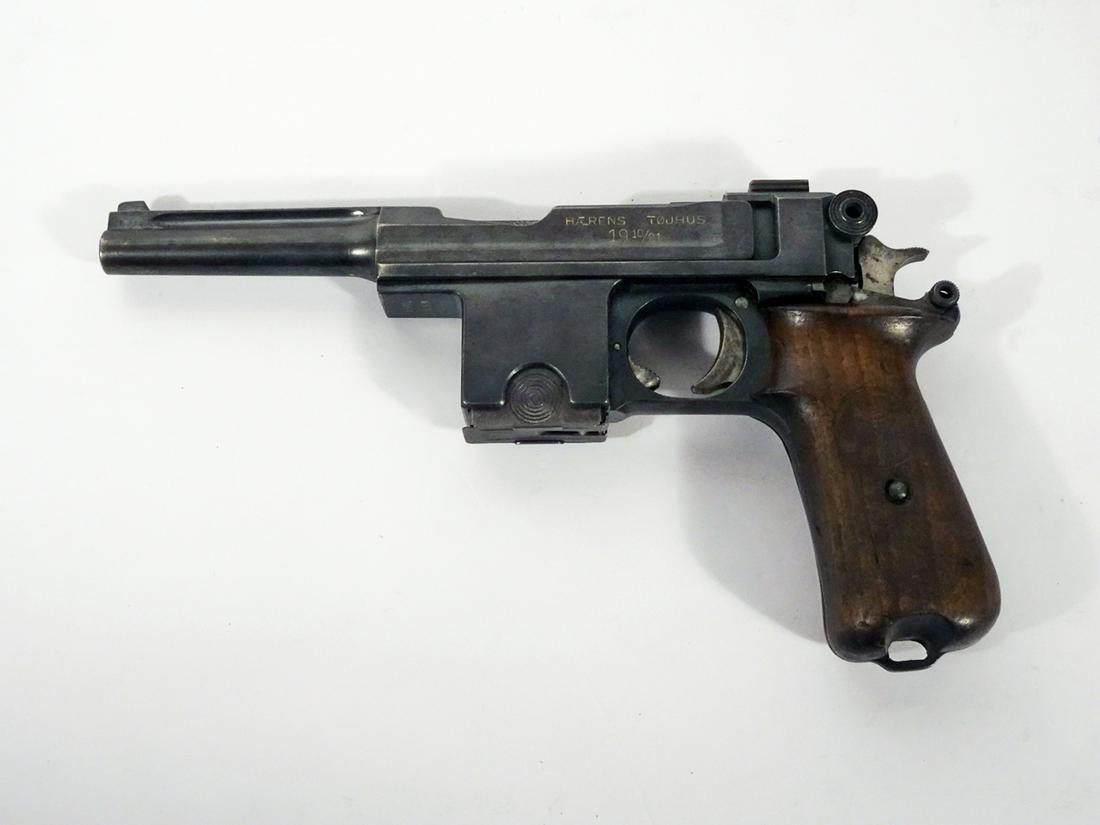 Danish Bergmann Model 1910/21 Pistol: Danish Bergmann model 1910/21 pistol, semi-automatic, 9mm caliber, 5 or 50 shot, magazine feed, serial number 5398, barrel length 4", overall length 9 3/4", marked "RKV 556" under receiver, C & R YES,