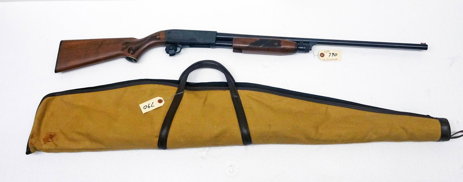Ithaca Model 37 Shotgun: Ithaca model 37 shotgun, pump action, 20 gauge 2 3/4 chamber caliber, 4 shot, tube feed, serial number 371258068, barrel length 25 1/2", overall length 45, comes with soft shell carry case, C & R NO,