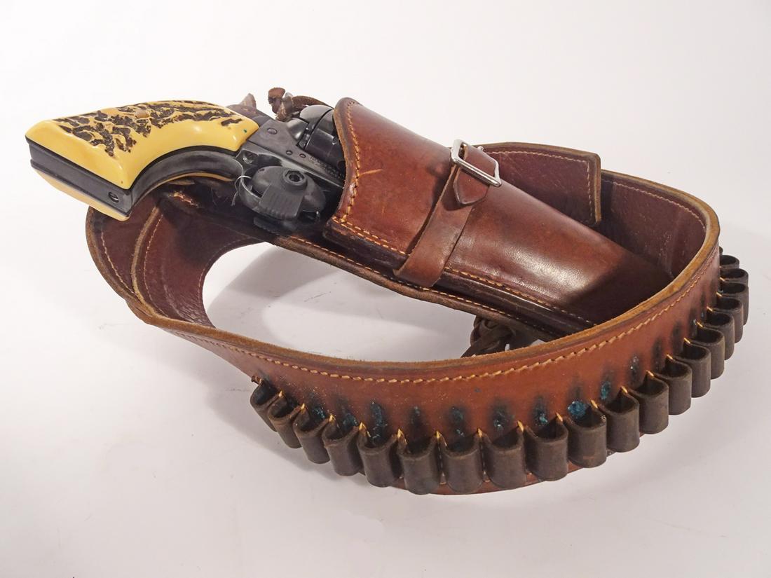 J.P. Sauer & Sohn Western Marshal Model Revolver: J.P. Sauer & Sohn Western Marshal model revolver with cowboy belt and holster, made in Western Germany, single action, .44 mag caliber, 6 shot, serial number 251514, barrel length 6", overall length 1