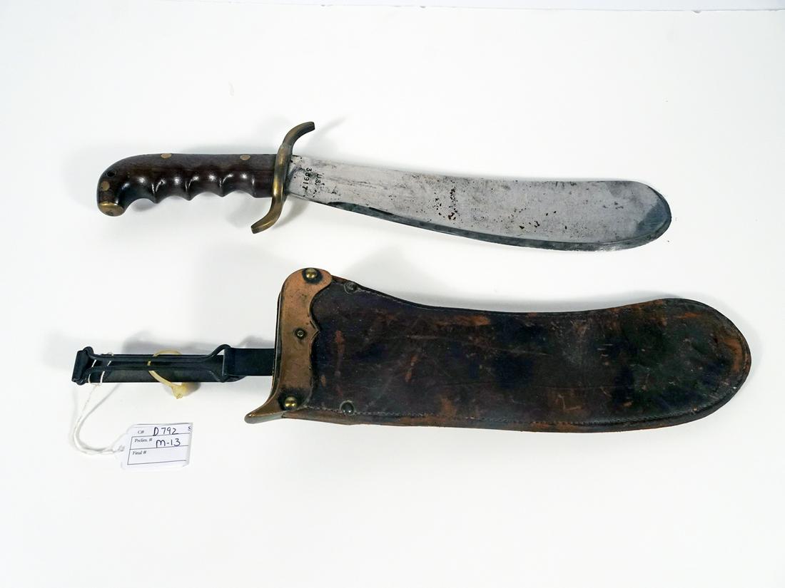 U.S. Army Model 1904 Hospital Knife: U.S. Army model 1904 hospital knife, 12" length curved blade, ricasso is marked "U.S. 33917", the obverse is marked "SA 1913", wood handle, original copper and leather scabbard, 17 1/2" overall length