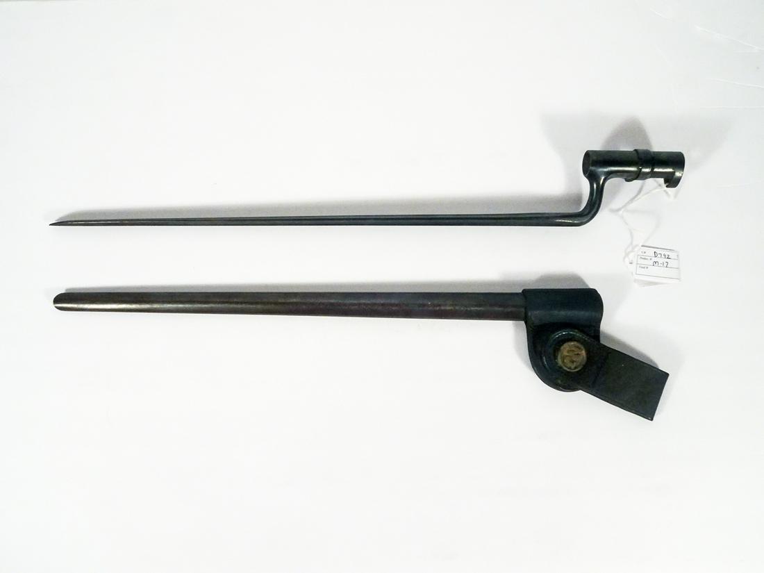 US Springfield M1873 Socket Bayonet: US Springfield trapdoor rifle M1873 socket bayonet, 18" length triangular edge blade, ricasso is marked "US", leather fog with brass NJ swivel, original metal scabbard, 21" overall bayonet size, 22" o
