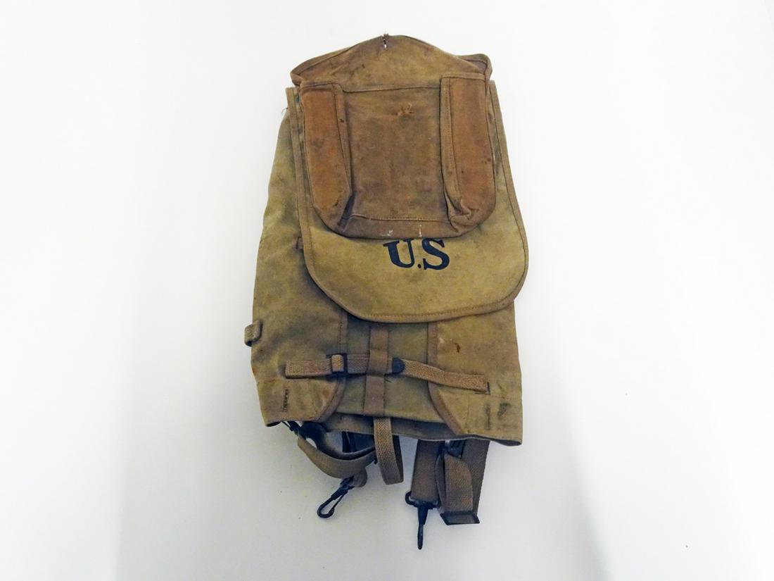 WWI U.S. Army M1910 Haversack: WWI U.S. Army M1910 haversack field bag backpack complete with meat can pouch attached to the flap, marked "Canvas Products Co. July 1918, 18" (height) x 12" (length)