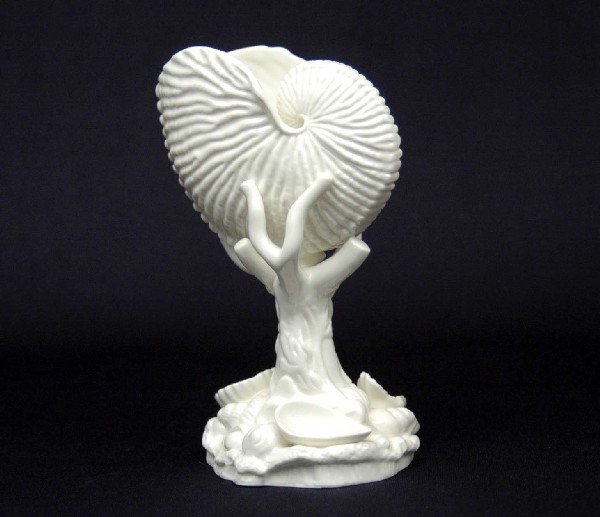 Royal Worcester nautilus shell, white porcelain, ma: Royal Worcester nautilus shell, white porcelain, marked on bottom, Made in England, 101, 6 1/2" high x 4 1/2" across, 20th C.