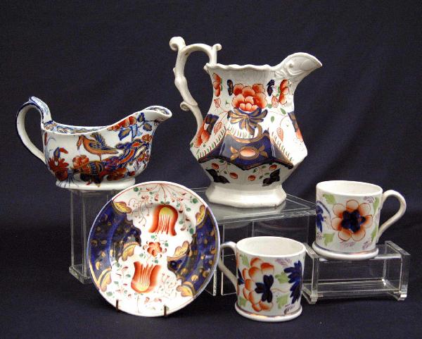 Grouping of English Gaudy Dutch and Pearlware grav: Grouping of English Gaudy Dutch and Pearlware gravy, Gaudy Dutch includes milk jug 7" high, two teacups 2 5/8" high, and 5 1/4" diameter saucer, and Spode Pearlware Opaque china "Chinese Bird" pattern