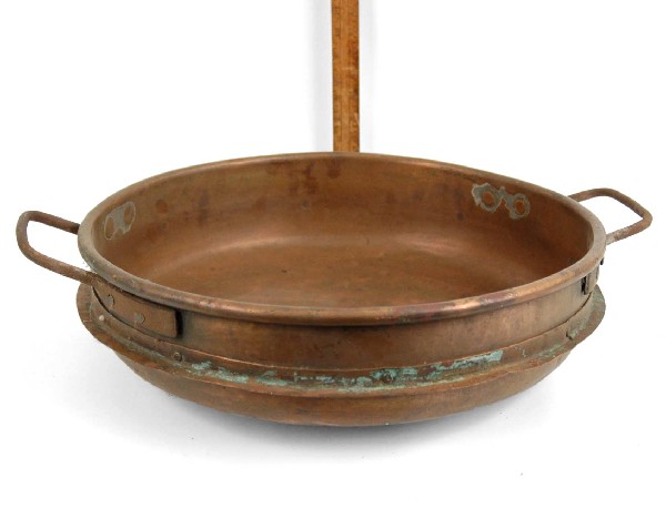 Copper candy kettle from Stutz Candy Company, with: Copper candy kettle from Stutz Candy Company, with lip for double boiler, 5 1/2" high x 23 1/2" diameter, early 20th C.