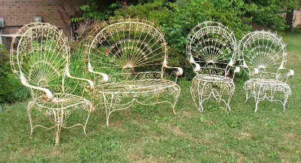 Victorian wire high back wrought iron patio set, i: Victorian wire high back wrought iron patio set, including settee 50" high x 50" across x 22" deep, two armchairs 47" high x 30" across x 21" deep, and rocker 47" high x 30" across x 32" deep, all wit