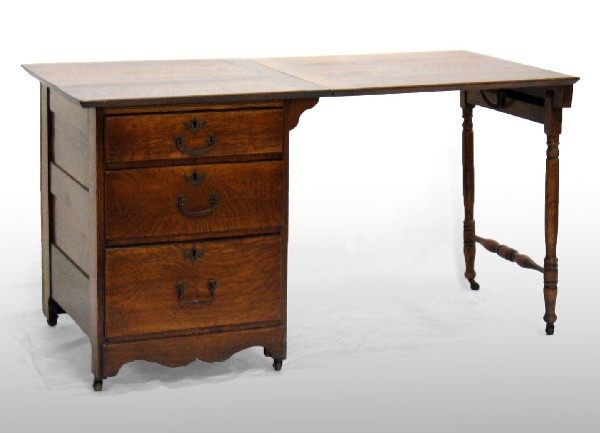 Oak drop leaf sewing table, 26" high x 49" across : Oak drop leaf sewing table, 26" high x 49" across x 23" deep, early 20th C.