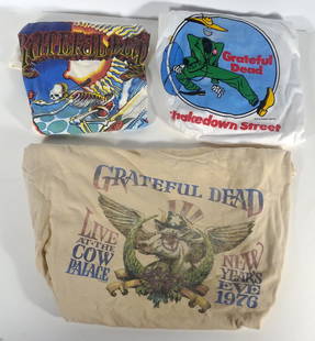 The Grateful Dead T-Shirt Grouping: Three piece The Grateful Dead t-shirt grouping, 1976 New Years Eve size 2XL, 1976 Shakedown Street size Large and sleeveless Summer Tour of 86 size Xl