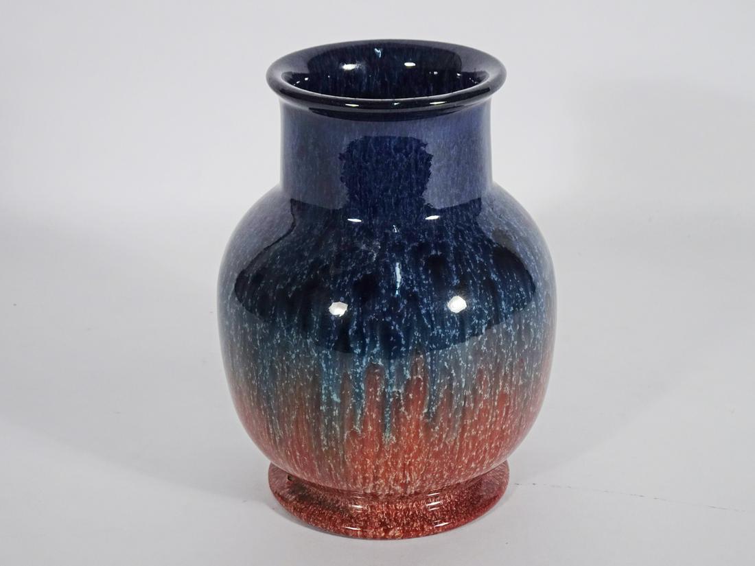Bretby English Art Pottery Vase: Bretby English art pottery vase, blue to red flambe glazed, signed on underside of base England with rising sun over Bretby name and 1818c shape number, circa 1920's-1930's, 7" (height) x 5" (length)